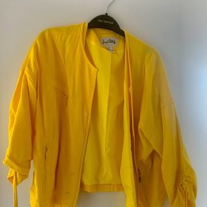 Yellow cropped quarter sleeve jacket with gold zippers  half zip up